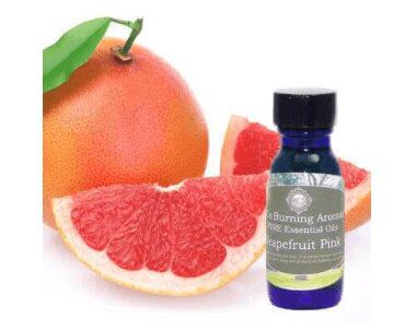 grapefruit essential oil with a grapefruit